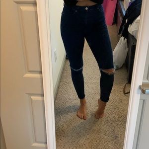 Knee rip high waisted jeans